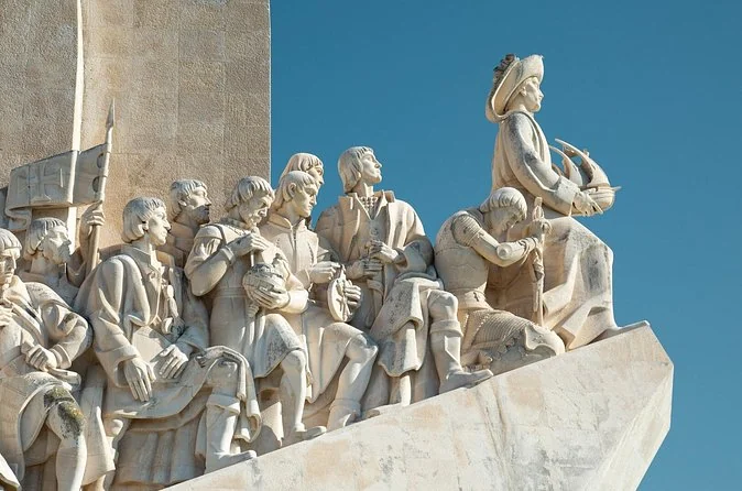 Stone figures carved on the Padrão dos Descobrimentos